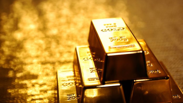 投机仓位下降抑制金价，ETF持续流入提供支撑